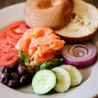 Bagel Nova Platter · Nova, cream cheese, onions, lettuce, tomato, and olives.