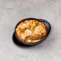 18. Kimchi Jjigae · Spicy kimchi stew with pork, vegetables and tofu. Spicy. Served with a bowl of rice