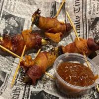 Jalapeno Poppers · Choice of 4 or 6 pieces cheese filled wrapped in bacon. Served with red pepper jam.