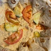 Sundried Tomato Hummus · Served with choice of toasted or fried pita bread.