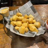 Beer Nuggets · Fried Pizza Dough with choice of red sauce, cheese sauce, or chili sauce. Extra sauce. 