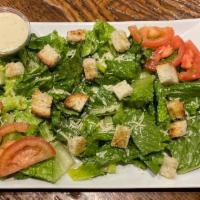 Caesar Salad · Romaine, parmesan, tomato, croutons, Caesar dressing. 