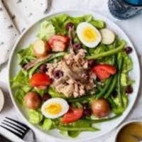 Salade Nicoise · Mixed greens, tuna, tomatoes, green beans, hard-boiled egg, red pepper, celery and red onions.