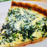 Quiche A L' Epinard · Spinach, goat cheese, onions and eggs.