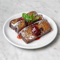 Banana Bread · Chocolate chips, almond flour, warm strawberry compote.