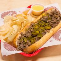 The Texican Cheesesteak · Beef or chicken, grilled onions, mozzarella, jalapenos and 2 oz. queso on side.