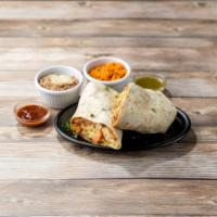 Burrito Dinner · One burrito served with a side of rice and beans. A giant flour tortilla filled with lettuce...