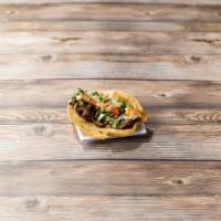 Taco · Corn or flour tortilla filled with cilantro, onions and your choice of meat or veggies.