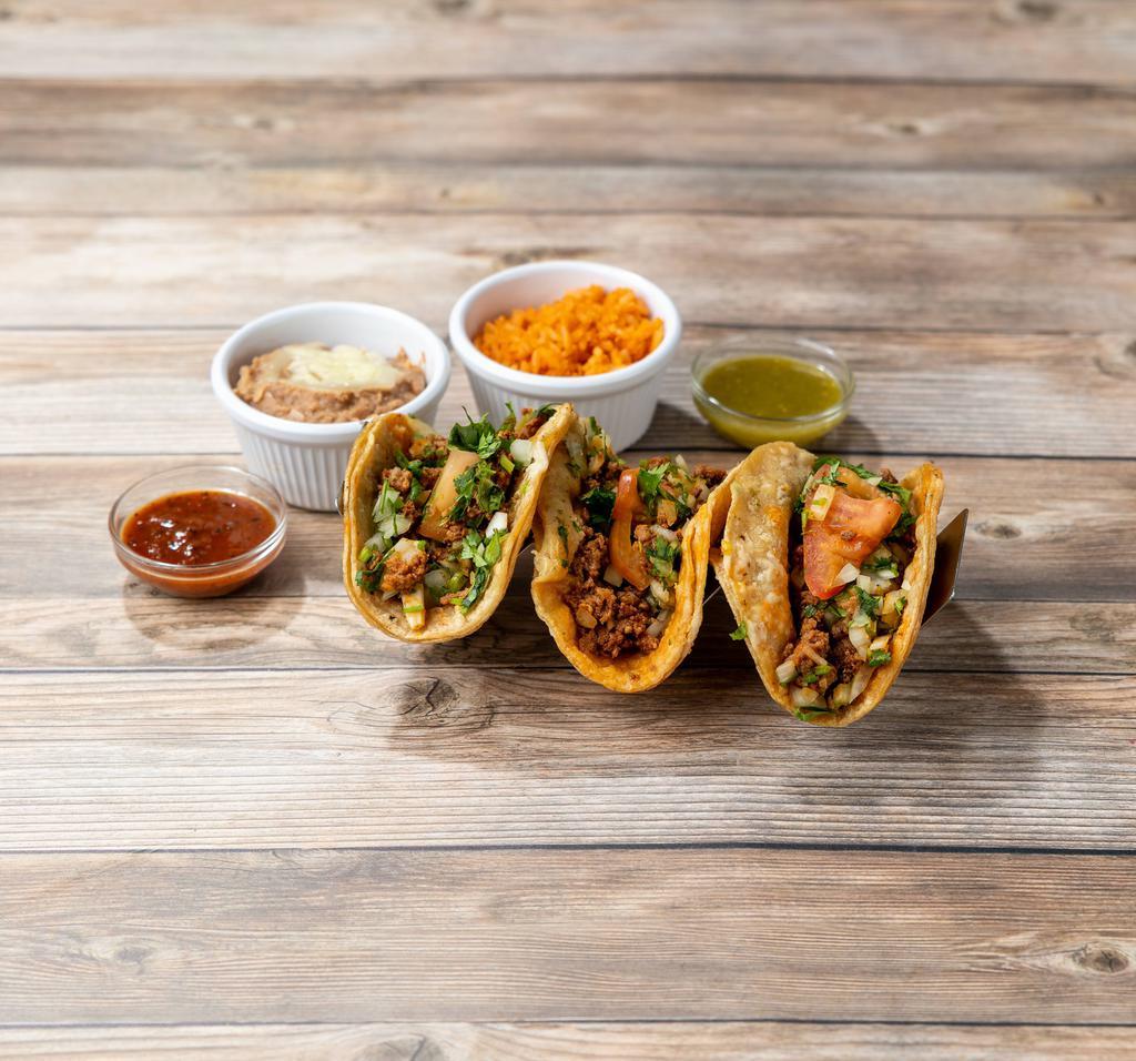 Taco Dinner · Three tacos served with a side of rice and beans. Corn or flour tortilla filled with lettuce, tomato, cilantro, onions and your choice of meat or veggies.