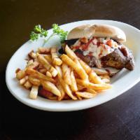 Jerk Chicken Sandwich · Juicy tender chicken, marinated in our incredible house jerk seasonings and slowly smoked to...