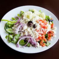 Greek Salad · Spring mix, tomatoes, red onions, cucumbers, bell peppers, feta cheese, Kalamata olives topp...