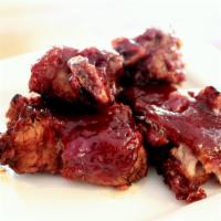 Baby Back Pork Riblets (1/2 rib) · Our Baby Back Ribs cut in half, perfect for just a few bites of ribs to go with your other m...