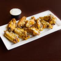 Hot Wings · Baked wings, never fried, smothered and baked with the with sauce on them