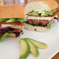 Chicken Avocado BLT Sandwich · Grilled chicken breast, avocado, applewood smoked bacon, lettuce, tomato, red onion, topped ...