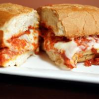 Chicken Parmesan Sandwich · Grilled and breaded chicken breast, topped with mozzarella cheese and red marinara sauce. Co...