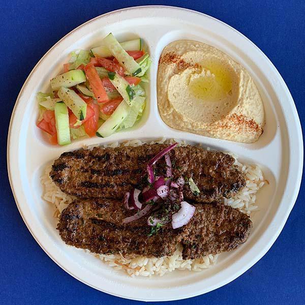 #2. Kafta Kabab Plate · Grilled seasoned lean ground beef and lamb served over rice, with hummus and garden salad.