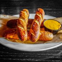 4 Piece City Tavern Pretzel  · Soft pretzel sticks served with queso cheese. 