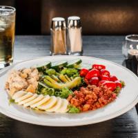 City Tavern Cobb Salad   · Mixed greens, roasted chicken, bacon, grape tomatoes, egg, avocado, cucumber with sherry vin...