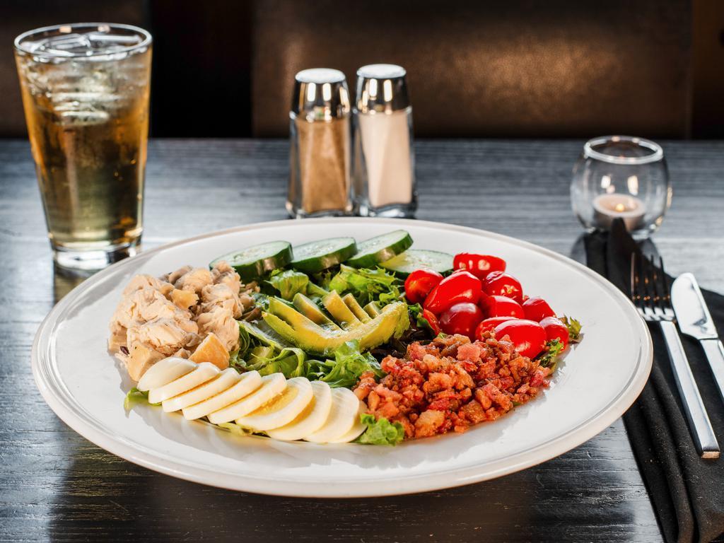 City Tavern Cobb Salad   · Mixed greens, roasted chicken, bacon, grape tomatoes, egg, avocado, cucumber with sherry vinaigrette. City tavern favorite.
