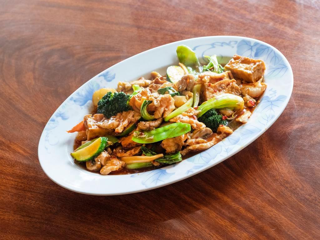 House Tofu with Chicken · Hot and spicy. White meat chicken, crispy tofu, broccoli, bamboo shoots, water chestnuts in spicy brown sauce.