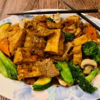 House Tofu with Beef · Hot and spicy. Beef, crispy tofu, broccoli, bamboo shoots, water chestnuts in spicy brown sa...