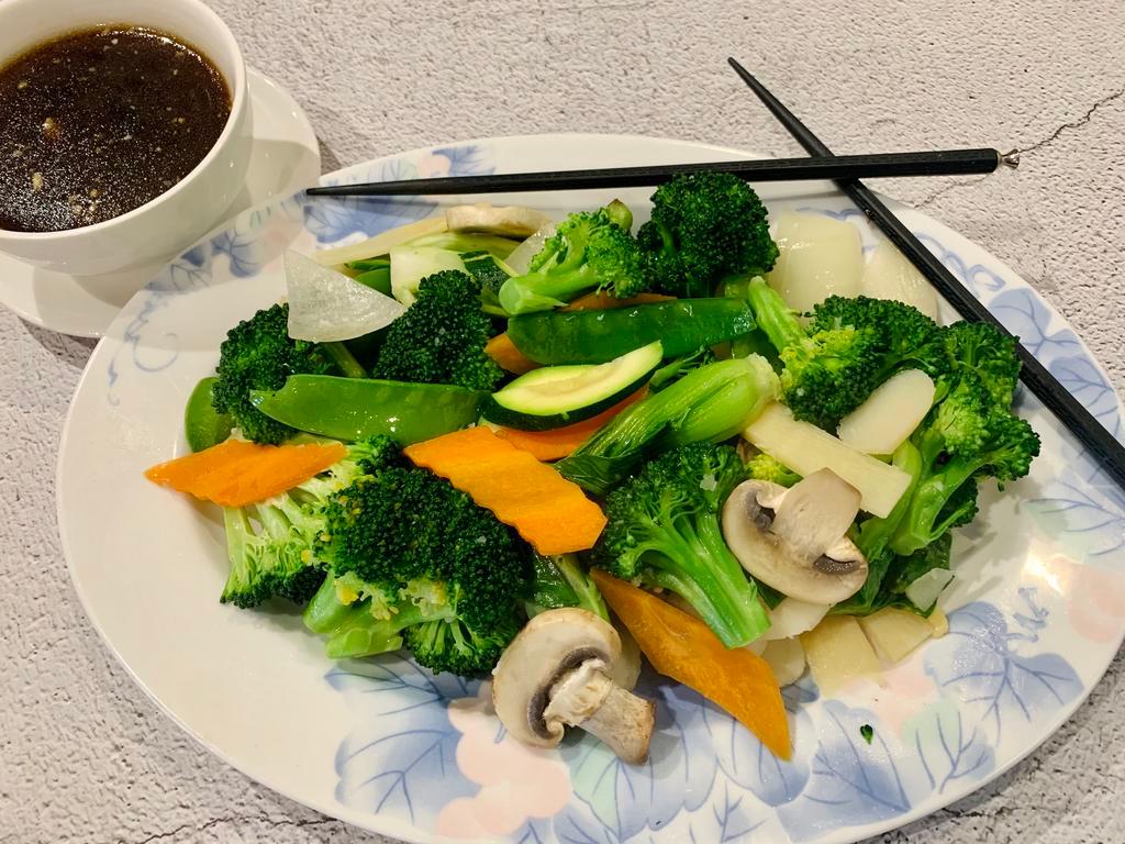 Steamed Mixed Vegetables · Mixed vegetables and light garlic sauce on the side. Vegan