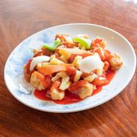 Sweet & Sour Pork · Crispy pork, bell pepper, onion, and pineapple in sweet and sour sauce.