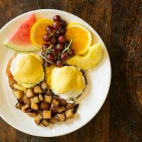 Eggs Benedict · English muffin, Canadian bacon and poached eggs. Served with diced potatoes. 