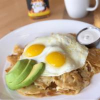 Chilaquiles Verde · House-made corn tortilla chips, salsa verde, avocado, pepper jack cheese, red onion and crem...