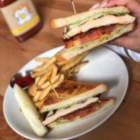 Avalon Sunset Sandwich · Grilled chicken breast, bacon, tomato, Swiss, smashed avocado, and toasted sourdough.