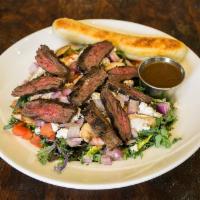 Steak and Greens Salad · Kale and mixed greens, red onion, cucumber, tomato, button mushroom, goat cheese, 6 oz. slic...