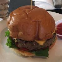 American Classic Burger · American cheese, lettuce, sauteed onion, tomato and house-made sauce, mayo and ketchup mixed...