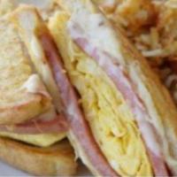 French Toast Melt · Scrambled egg, pork roll and cheese melted between 2 slices of French toast.
