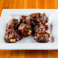 BBQ Pigsticks · A full lb. of pig wings drenched in Rehab's own spicy pineapple BBQ sauce.