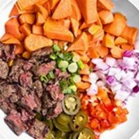 Boss Bowl · 2 organic grass-fed bison patties, grilled sweet potatoes, red onions, green onions, red pep...