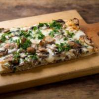 Truffle Porcini Pizza (large) · Mix of porcini mushrooms, fresh mozzarella, truffle oil and fresh parsley.
