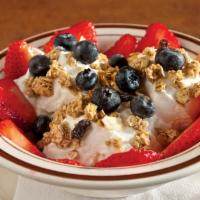Yogurt Delight · Greek yogurt topped with granola, fresh strawberries, blueberries and drizzled with pure hon...