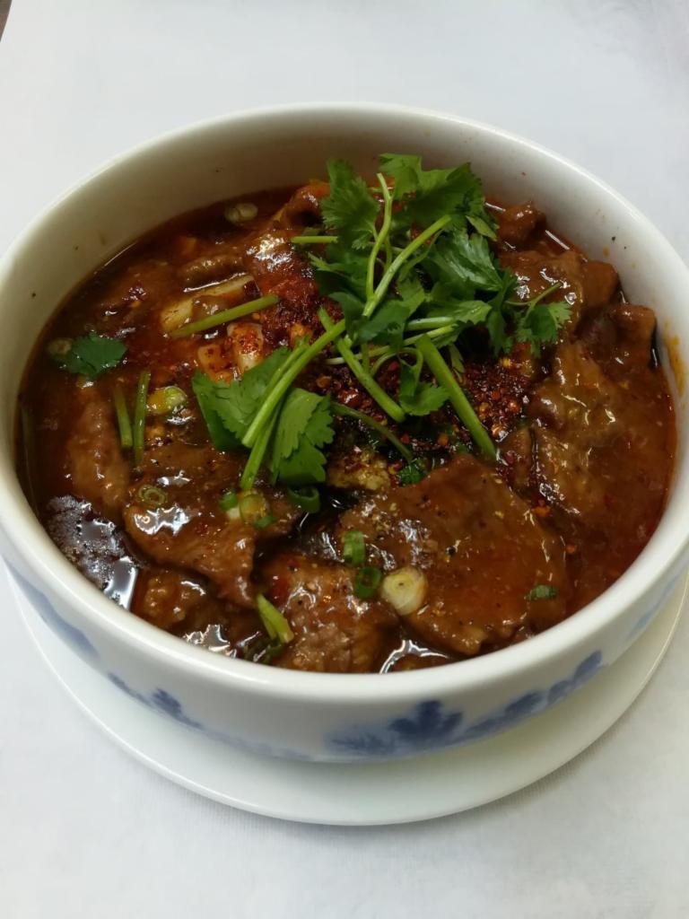 Braised Beef w. Chili Sauce 水煮牛肉 · Hot and spicy.