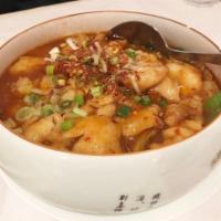Fish Filet w. Chili Sauce 水煮鱼片 · Hot and spicy.