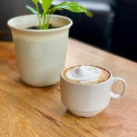 Traditional Cappucino · Double espresso with hot milk and milk foam (6 oz traditional)