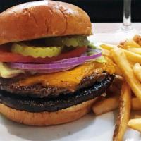 Black Angus Burger · Double patty, aged sharp cheddar.