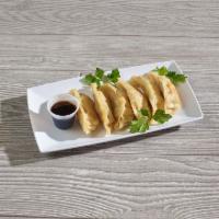 6 Pieces Gyoza · Pan-fried Japanese dumplings.