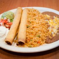Chicken Flautas · 2 large corn tortillas rolled with fajitas chicken and cheese served with sour cream and gua...