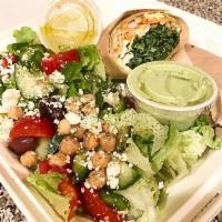 Greek Salad · Lettuce, cucumber, tomatoes, bell pepper, kalamata olives, pepperoncini, garbanzo beans, fet...