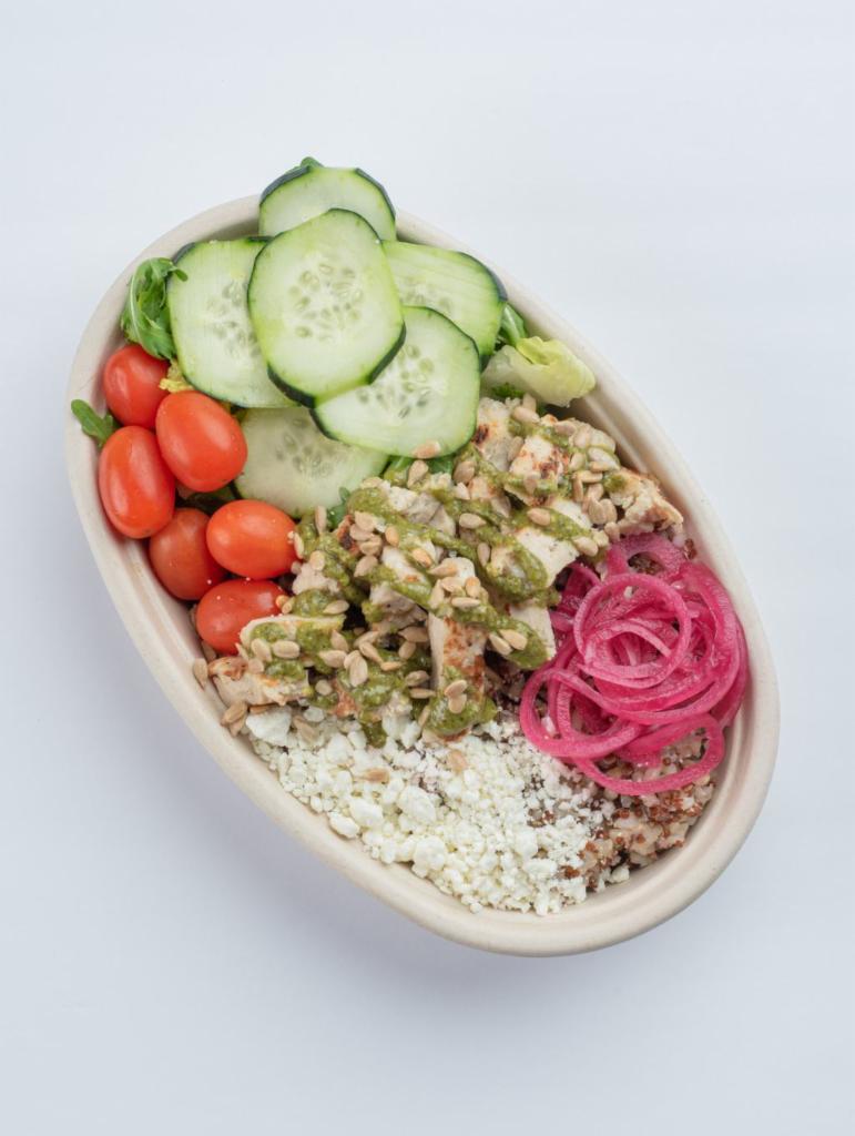 Power Pesto Chicken Bowl · Grain Blend, Super Greens, Chicken, Grape Tomato, Cucumber, Pickled Red Onion, Basil Pesto, Dijon White Balsamic Vinaigrette, Goat Cheese, Sunflower Seeds 