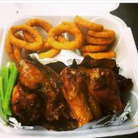 Traditional Wings · Bone in wings fried golden brown seasoned served with one side optional