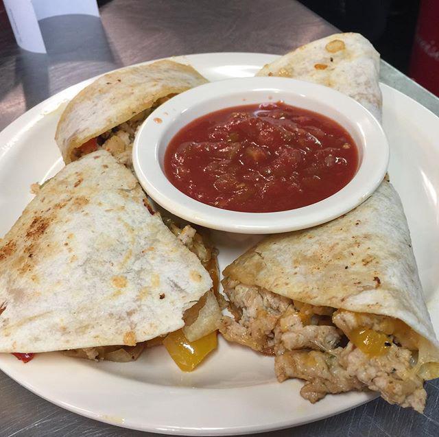Smoked Chicken Quesadilla · Grilled flour tortilla filled with shredded roasted chicken and Jack cheese