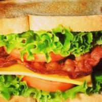 Classic BLT Lunch · Strips of bacon, mayo, fresh lettuce and tomato on a toasted bun.