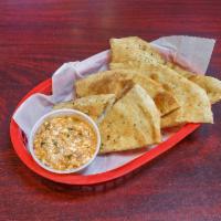 Spicy Feta Dip · Our house-made dough baked and served with a side of spicy feta cheese dip.