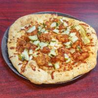 Nashville Hot Chicken Pizza · Shredded mozzarella, breaded chicken tossed with our house-made spice blend, topped with dil...